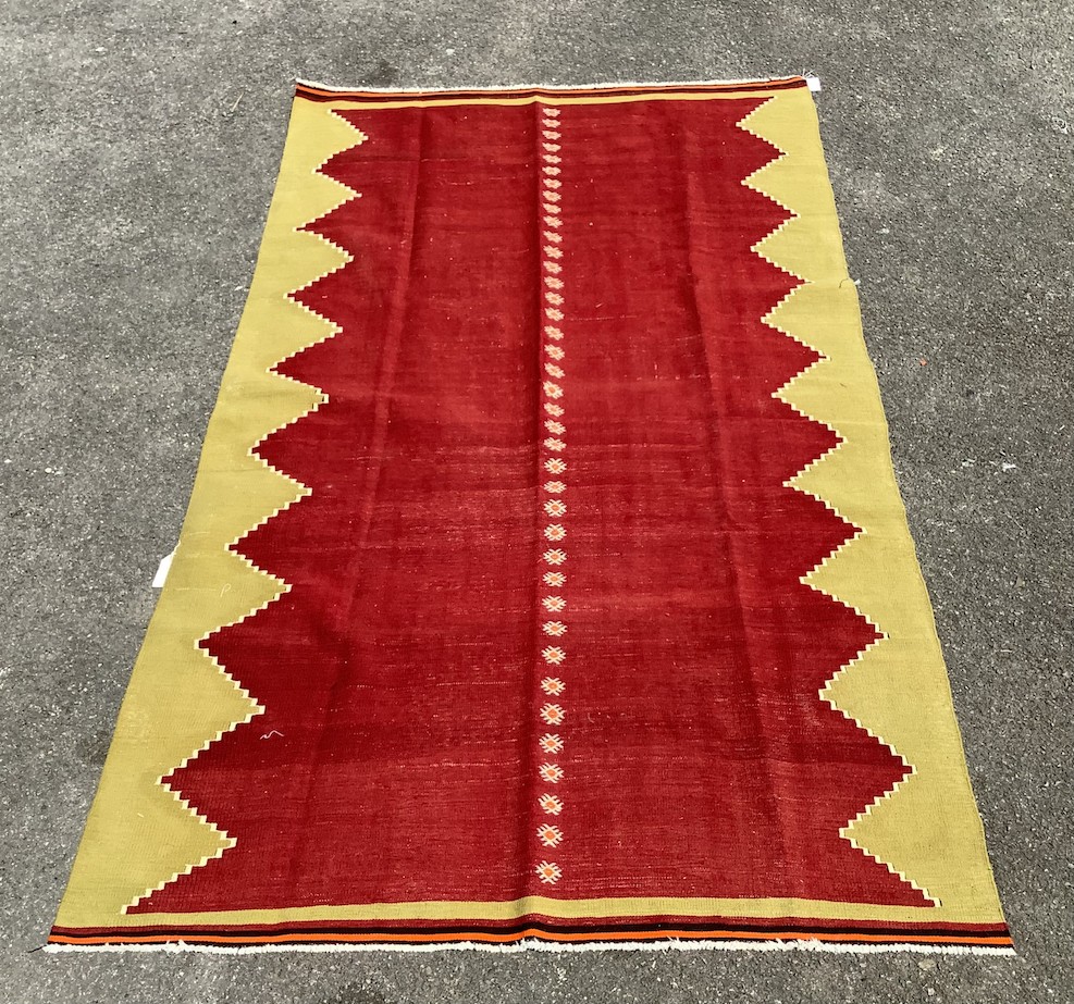 An Anatolian design polychrome Kilim flatweave carpet, 277 x 154cm